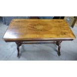 VICTORIAN WALNUT RECTANGULAR CENTRE TABLE WITH MARQUETRY INLAID DECORATION ON CRVED SPREADING