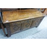 EARLY 19TH CENTURY OAK COFFER WITH CARVED DECORATION Condition Report: circular