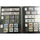 STOCK BOOK WITH LARGE SELECTION ISLE OF MAN MINT STAMPS ETC.