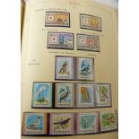 ONE ALBUM OF GRENADA & OTHER WEST INDIES STAMPS