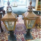 PAIR OF COPPER LAMPS WITH IRON BASES
