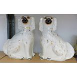 PAIR OF STAFFORDSHIRE POTTERY DOGS