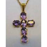 9CT GOLD AMETHYST SET CROSS ON FINE CHAIN