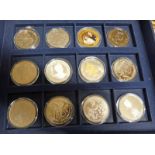 12 MINT COMMEMORATIVE COINS INCLUDING H M QUEEN ELIZABETH THE QUEEN MOTHER 1900-2002