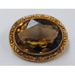 OVAL CITRINE SET BROOCH MARKED 9CT