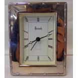 SILVER CASED CLOCK BY HARRODS Condition Report: Silver is in good condition.