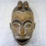 WEST AFRICAN MASK WITH TWIN HAIR CRESTS,