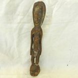 SEPIK ANCESTOR FIGURE WITH TRACES OF WHITE PIGMENT,