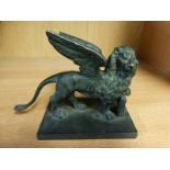 BRONZE FIGURE OF WINGED LION ON RECTANGULAR BASE..