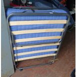 METAL FRAMED BLUE FOLDING BED