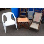 WOODEN FOLDING CHAIR WITH A WHITE PLASTIC CHAIR AND FOLDING WOODEN STOOL