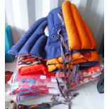 LARGE SELECTION AS JUNIOR SIZED LIFE VESTS AND SOME MEDIUM IN VARIOUS STYLES