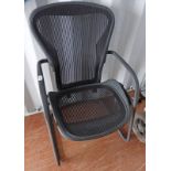 METAL FRAMED ARMCHAIR