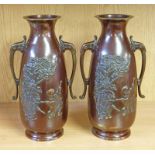 PAIR LATE 19TH CENTURY JAPANESE TWIN HANDLED VASES EMBOSSED WITH FIGURES - 27 CM TALL
