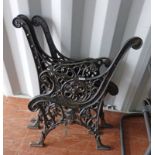 4 CAST IRON BENCH ENDS WITH FLORAL DECORATION.