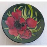 MOORCROFT PLATE WITH ANEMONE . DIAMETER 11.