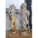 PAIR OF CONTINENTAL PORCELAIN FIGURES OF A LADY 7 GENTLEMAN,