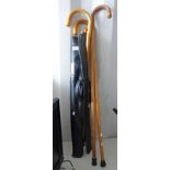 4 WALKING STICK AND POOL CUES IN BAGS