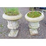 PAIR EARLY 20TH CENTURY GARDEN URNS WITH FLORAL DECORATION