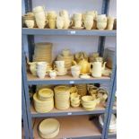 A LARGE SELECTION OF MUSTARD COLOURED TABLEWARE INCLUDING WOODS,