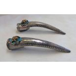 PAIR OF EARLY 20TH CENTURY ORIENTAL WHITE METAL FINGER NAIL EXTENSIONS WITH BLUE ENAMEL & FROG