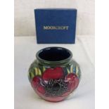 MOORCROFT VASE WITH ANEMONE PATTERN. HEIGHT 8CM BOXED.