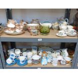 2 SHELVES OF TEA CHINA, TEAPOTS,