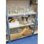 3 SHELVES OF VARIOUS GLASS SHADES CHAMPAGNE GLASSES ETC.