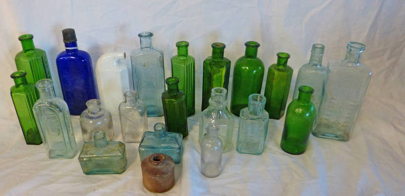 BOX OF ASSORTED COLOURED GLASS BOTTLES