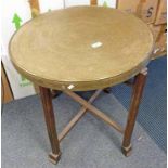 FOLDING TABLE WITH CIRCULAR BRASS TOP