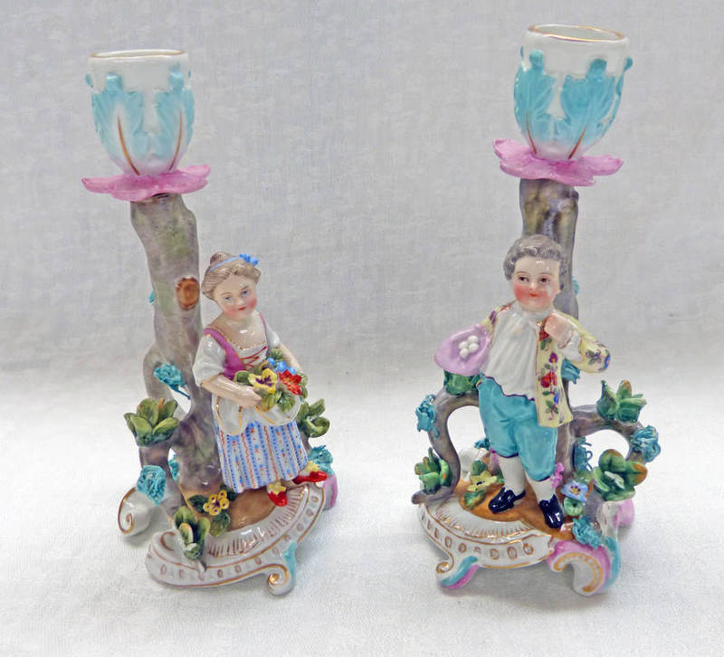 PAIR OF 19TH CENTURY CONTINENTAL PORCELAIN CANDLESTICK HOLDERS. HEIGHT 16.