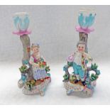 PAIR OF 19TH CENTURY CONTINENTAL PORCELAIN CANDLESTICK HOLDERS. HEIGHT 16.