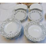 QUANTITY OF MEISSEN PORCELAIN PLATES WITH PIERCED WORK AND FLORAL DECORATION,
