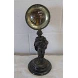 ANEROID BAROMETER WITH MAGNIFYING FRONT IN METAL FIGURE STAND,