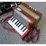 HOHNER MIGNON ACCORDION WITH RED MOTHER OF PEARL FINISH,