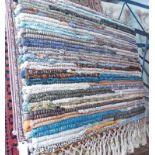 MULTI COLOUR STRIPED RUG WITH FRILLED ENDS 149 X 96CM