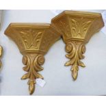 PAIR OF COMPOSITE GILT PANTED WALL BRACKETS