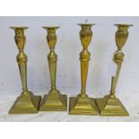 FOUR BRASS CANDLE STICKS