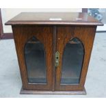 OAK CABINET WITH 2 GLASS DOORS AND FITTED INTERIOR Condition Report: some fading to