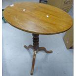 19TH CENTURY MAHOGANY OVAL FLIP TOP TABLE ON SPREADING SUPPORTS