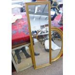 OVAL GILT FRAMED MIRROR,