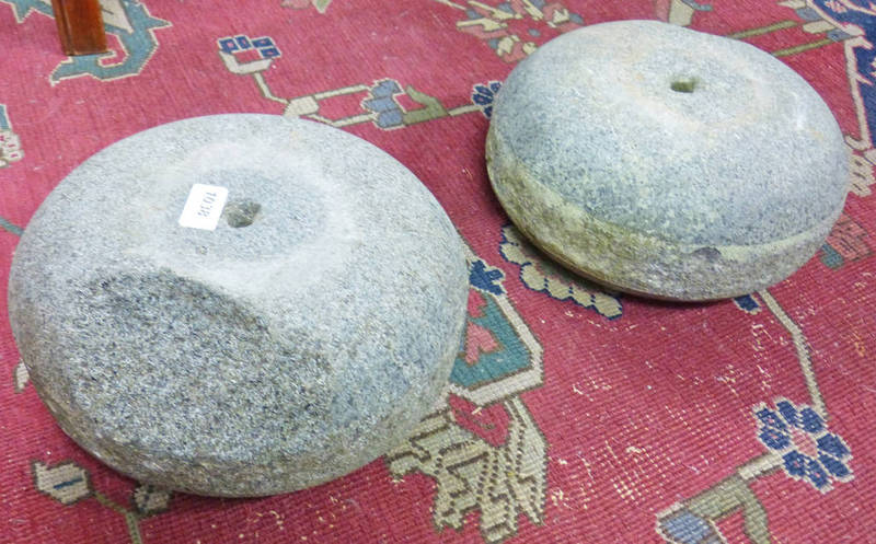 PAIR OF CURLING STONE DOOR STOPS