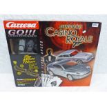 SELECTION OF JAMES BOND RELATED ITEMS INCLUDING WALKIE TALKIE SET, CARRERA ELECTRIC SLOT RACING SET,