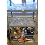 SELECTION OF VARIOUS PORCELAIN GLASS AND BOOKS OVER FOUR SHELVES