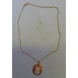 9CT GOLD MOUNTED OVAL CAMEO PENDANT ON 9CT GOLD CHAIN