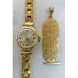 GAMY LADY'S WRISTWATCH MARKED 585 & YELLOW METAL PENDANT