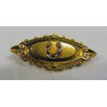 19TH CENTURY HORSESHOE BROOCH SET WITH HALF PEARLS & GARNETS