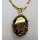 9CT GOLD OVAL CITRINE SET PENDANT ON 9CT GOLD CHAIN