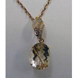 OVAL GEM AND DIAMOND SET PENDANT ON CHAIN MARKED 9 C