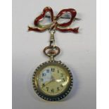 DECORATIVE FOB WATCH WITH ENAMELLED PEARL SET BACK AND HANGER